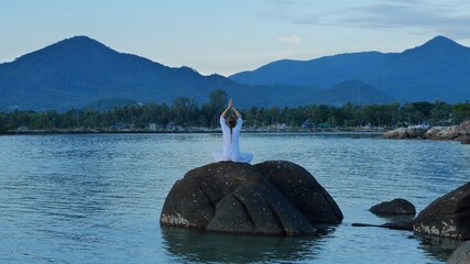 Fototapeta na wymiar Yoga in nature, namaste exercise meditation, serenity and yoga practicing