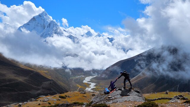 Active Hikers Hiking, Reach The Summit, Enjoying The Success View, Freedom And Happiness At Amazing Landscape View. Way To Everest Base Camp