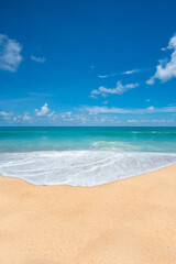 tropical beach with blue sky and clouds