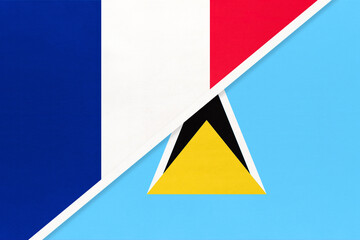 France and Saint Lucia, symbol of national flags from textile. Championship between two countries.