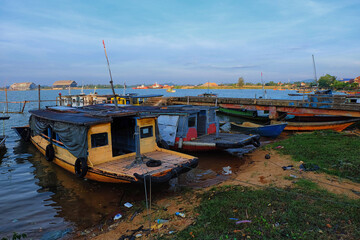 Boat moored to the beach near Seberang Takir fisherman village