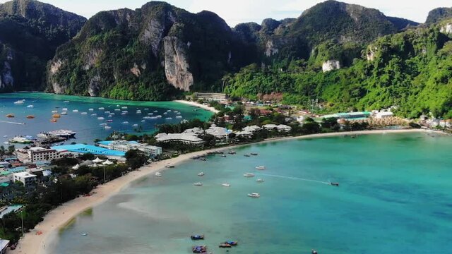 Aerial view to Lo Dalum beach with boats in a sunny day, Ko Phi Phi, Thailand
