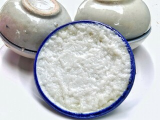 Khanom Thuay or Custard in a small porcelain cup. Thai desserts made from coconut milk, Sweet and tasty