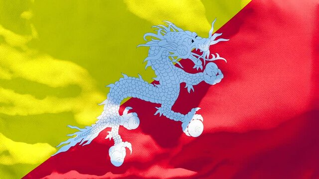The national flag of Bhutan is flying in the wind