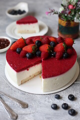mousse cake with berries on top