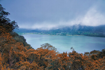 Awesome nature view of Buyan Lake in Bali. Soft focus effect due to long exposure technique