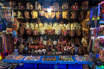 Long exposure shot of a stall selling unique souvenir from Sanur Beach, Bali with overexpose effect due to high intensity of the light