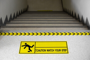 Beware of falling stairs symbol, yellow and black