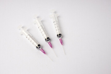 syringe and pills