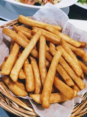french fries on a wooden table