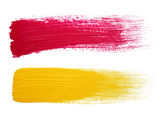 Brush strokes of yellow and red paint isolated on white