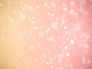 Golden background with soft bokeh lights.