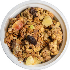 Muesli in a round jar isolated on a white background. Diet breakfast with milk or yogurt. Selective focus.
