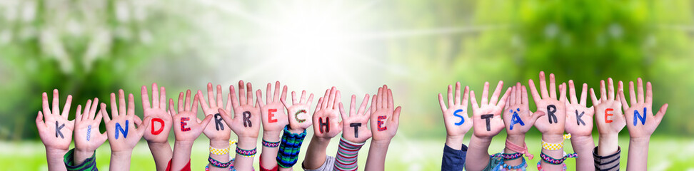 Children Hands Building Colorful German Word Kinderrechte Staerken Means Strengthen Children...