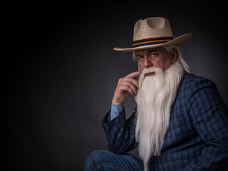 Portrait of a courageous and brutal, majestic mature man, financier, businessman, farmer with gray...