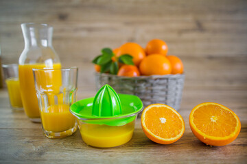 Fresh orange juice in the glass jar.