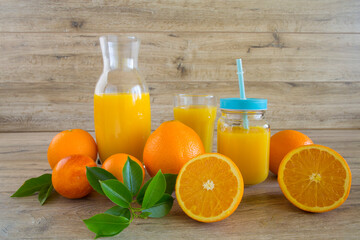 Fresh orange juice in the glass jar.