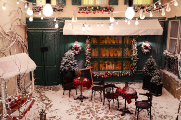 Beautiful outdoor cafe with festive decoration. Christmas celebration