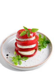 Caprese, tomatoes with mozzarella and Basil
