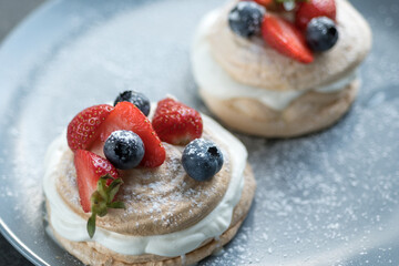 Australian famous Pavlova dessert with berries
