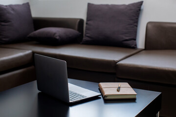 Fototapeta premium sofa work from home macbook notebook