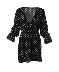 Beautiful short black polka dot dress on white background