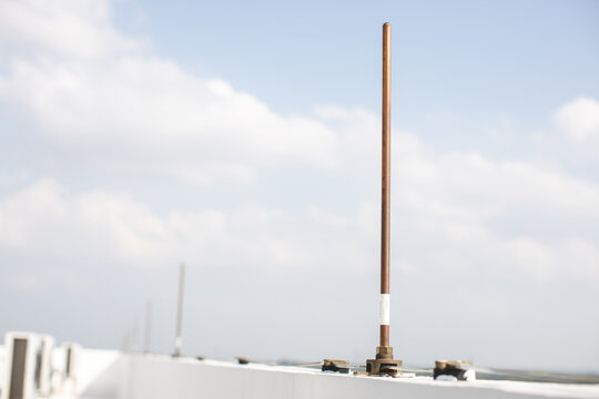 Copper lightning rods on tall buildings to prevent lightning strikes