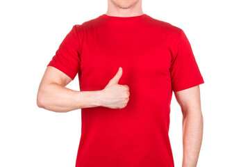 Front view of confident male in red t-shirt showing thumbs up gesture isolated