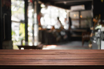 Empty desk platform over cafe background. For product display montage.