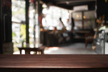 Empty desk platform over cafe background. For product display montage.