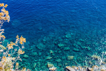 Fototapeta na wymiar View of Mediterranean Sea on a Sunny day, Cinque Terre, Italy