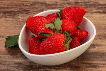 Ripe sweet strawberry with leaf