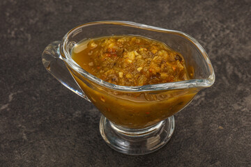 Green spicy sauce in the bowl
