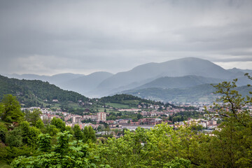 Fototapeta na wymiar Beautiful view of Bergamo (Upper city) from the San Vigilio Park. Bergamo, Lombardy, Italy