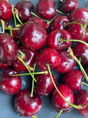Top view cherry in plate, closeup