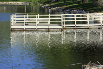Fototapeta premium Floating Dock on Sterling Lake in Kansas in the spring