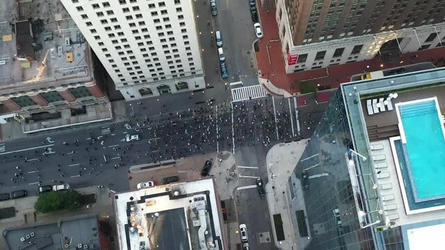 Black Lives Matter Protesting March in Downtown Baltimore USA, Top Down Aerial View. People Crown in Protest Against Police Brutality and killing by 