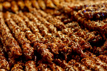 Delicious Churchkhela candy in shop.