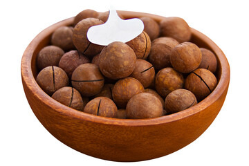 delicious macadamia nuts on  plate on  White background