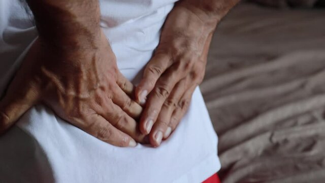 Close up man with low back pain