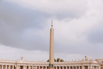 Fototapeta na wymiar Vatican, Rome / Italy 07.25.2019 . St. Peter's Square, the Basilica and Obelisk in the Vatican