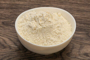 Wheat flour heap in the bowl