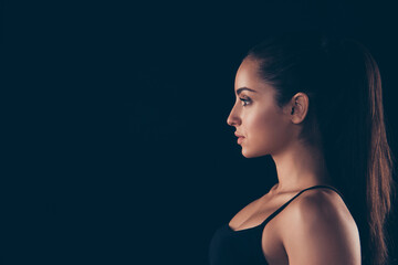 Close-up profile side view portrait of her she nice-looking attractive sportive confident focused strong lady fitness model healthy life style isolated over black background