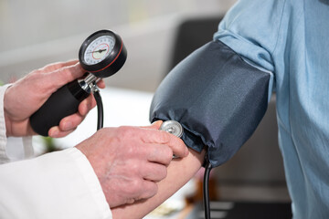 Blood pressure measurement of a female patient