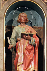 St. John the Evangelist statue on the main altar at St. Peter's Church in Sveti Petar Orehovec, Croatia
