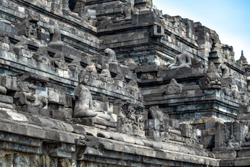 Fototapeta premium Statues and Stupas of the Borobudur Temple, West Java, Indonesia (750AD)