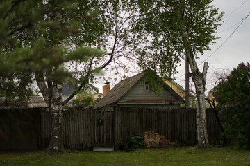 Plakat old green wooden house with a roof
