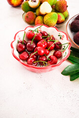 Cherries on a ceramic plate