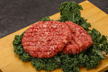 Raw beef burger cutlet for cooking