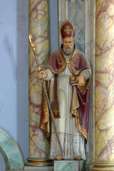 Fototapeta premium St. Nicholas bishop statue on the main altar in the Church of the Annunciation of the Blessed Virgin Mary in Klanjec, Croatia